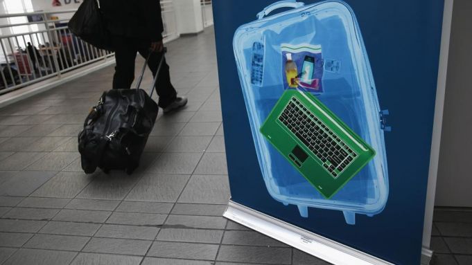 Britain lifts laptop ban on flights from Cairo